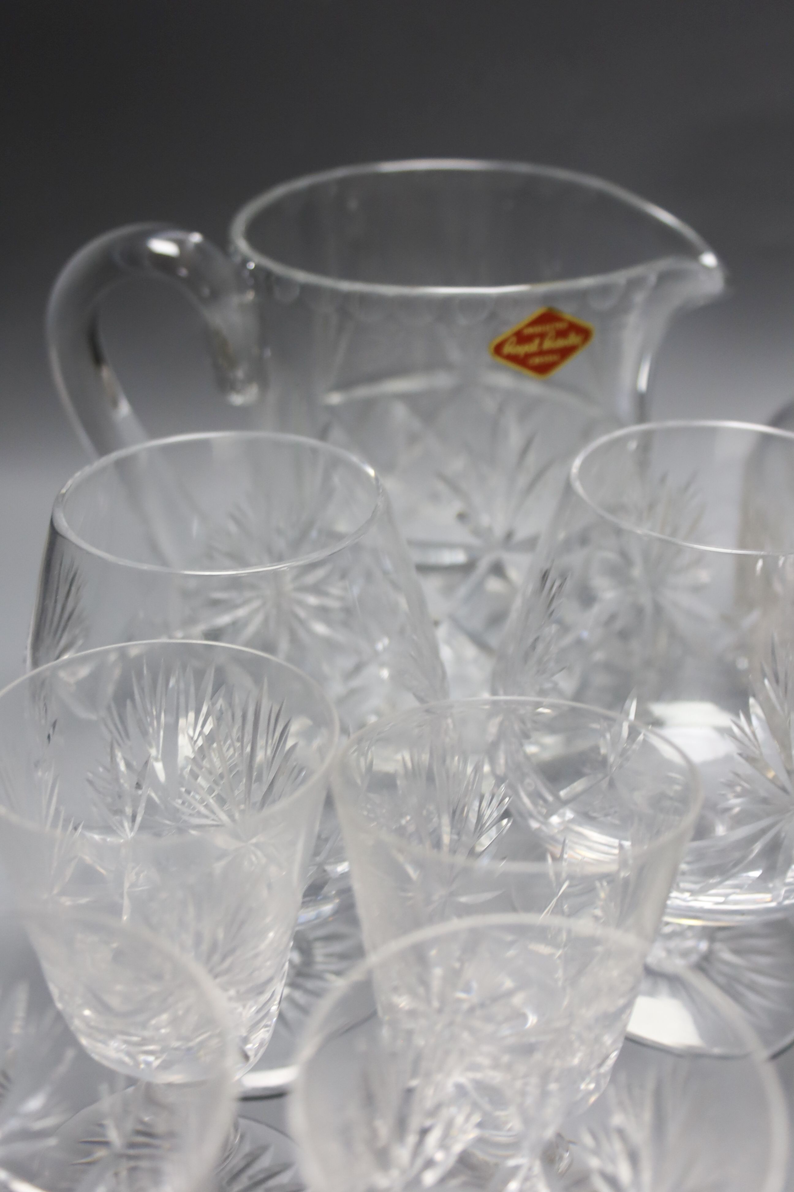 An assortment of ceramic and glass tableware. Also to include 18 pierced silver sweetmeet dishes